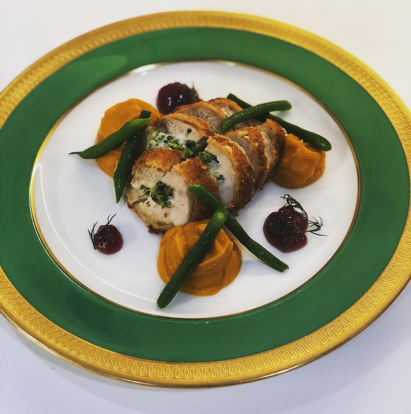 Broccoli cordon bleu over sweet potato purée with spiced cranberry