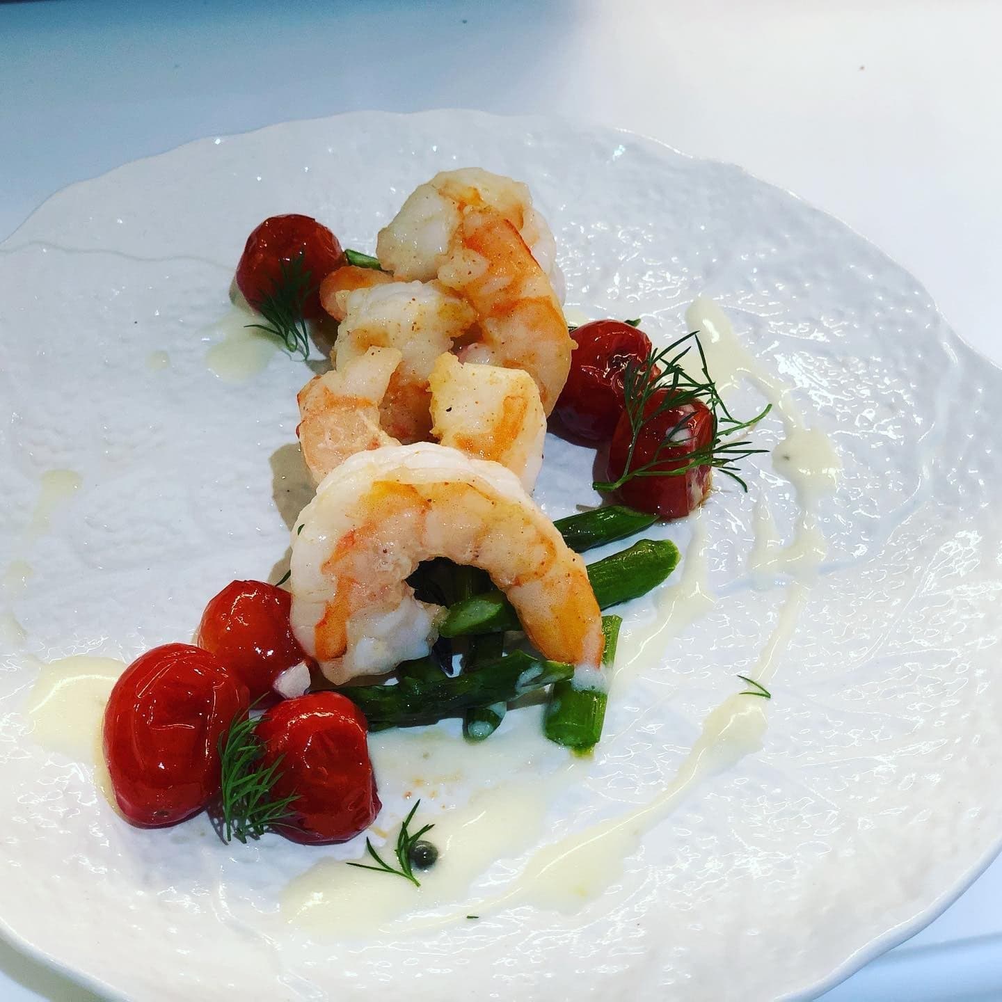 Seared shrimp with asparagus and blistered tomatoes